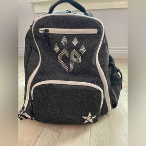 Rebel Dream Bag in black. Used for 2 seasons. No rips, stains, or gems missing.